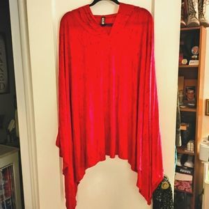 Loose and flowy, hooded poncho.